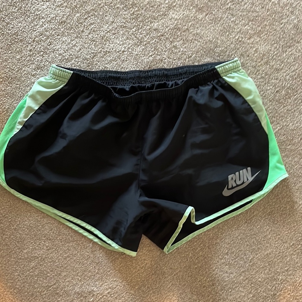 Green Nike running shorts